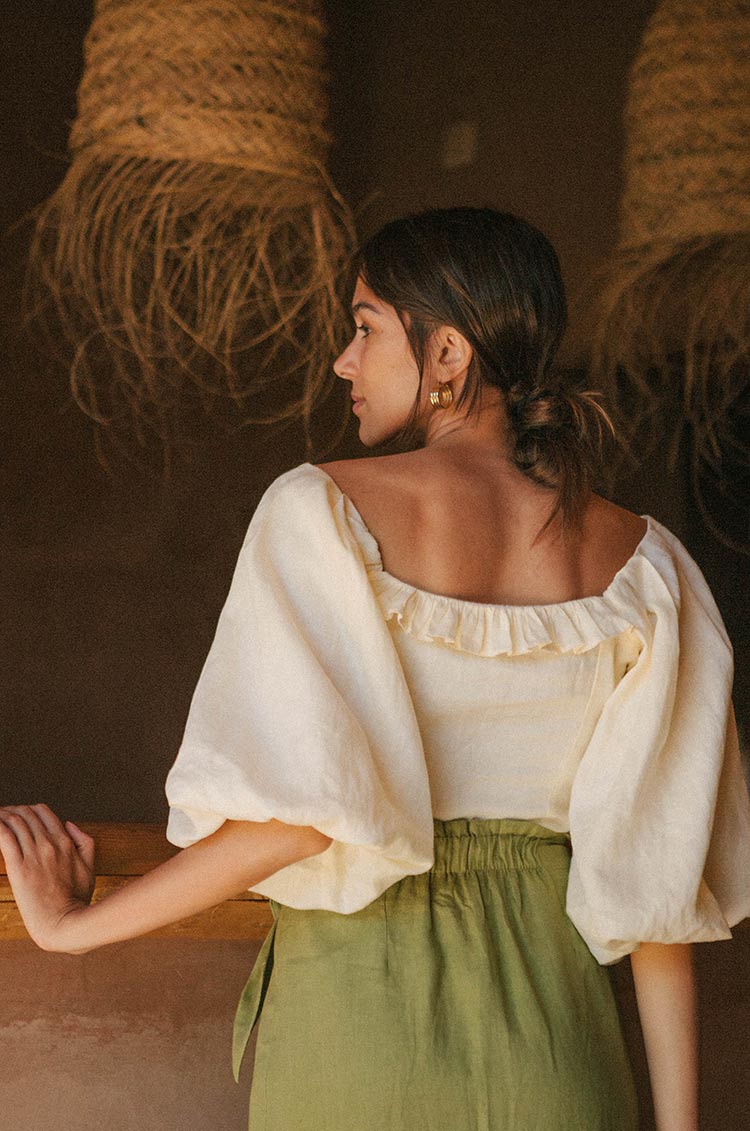 Ethically designed top with back frill edge details