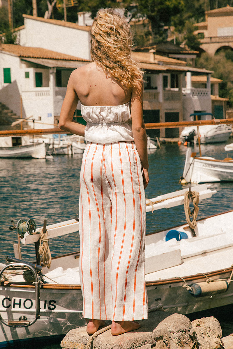 Red and white striped pants back pocket