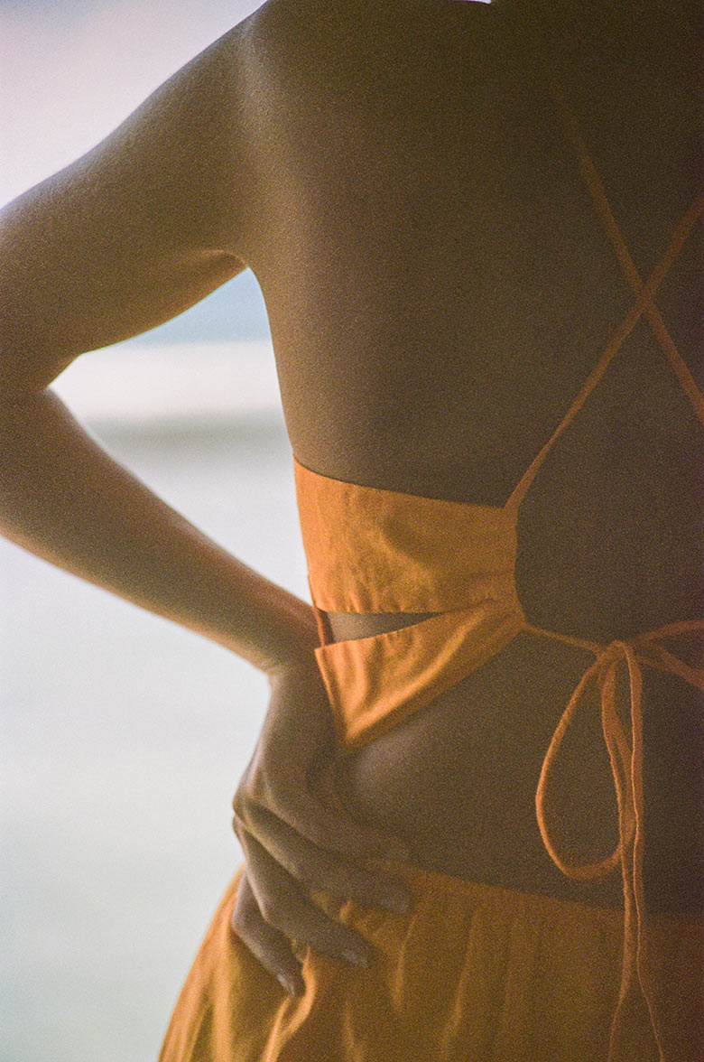 Bright orange tiered midi dress