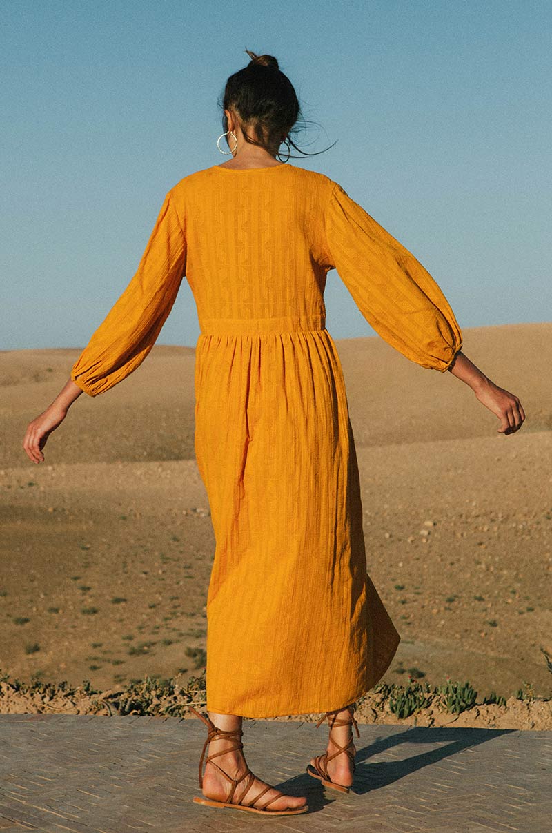 Honey-yellow midi dress with peasant sleeves